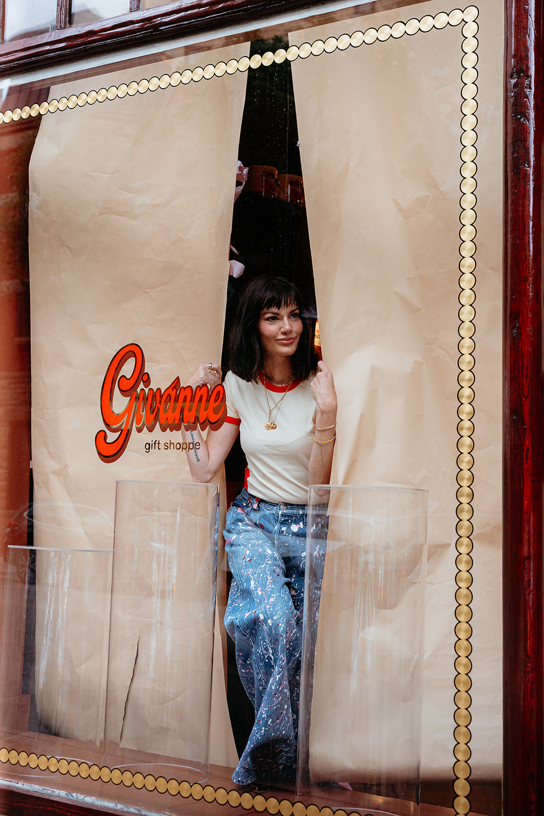 Givanne's founder, Ann, peering through the shop window at the Lincoln Park location in Chicago